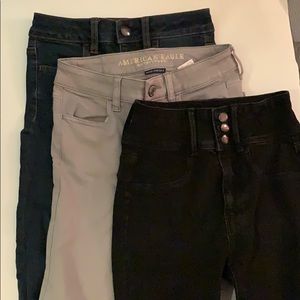 Three pairs of American Eagle jeans